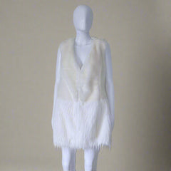 Mannequin wearing a white fur vest against a plain background