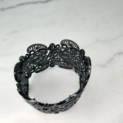 Black Unsigned Lace Cut Metal Bracelet