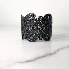 Black Unsigned Lace Cut Metal Bracelet