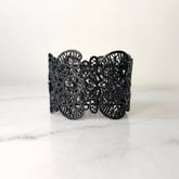 Black Unsigned Lace Cut Metal Bracelet