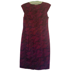 Red floral dress on a plain background