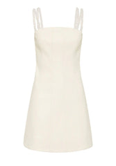 An ivory vegan leather mini dress with a square neckline, braided straps, and a fit-and-flare silhouette.