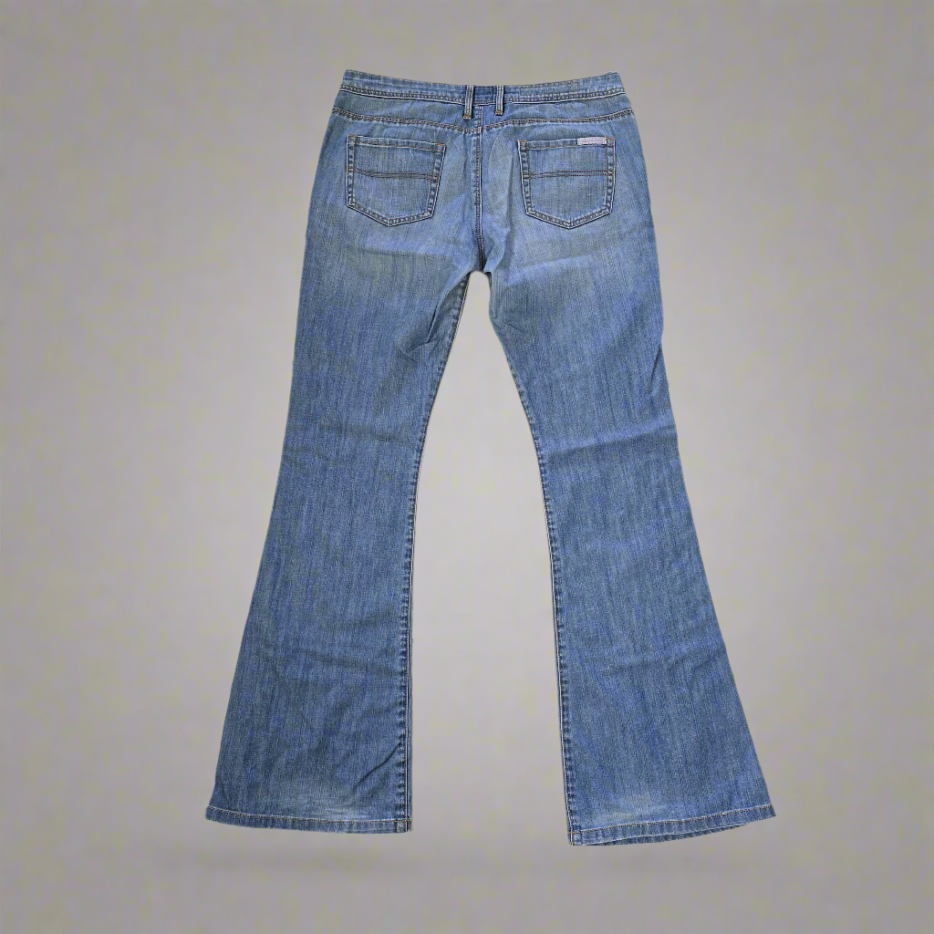 Pair of blue jeans on a gray background
