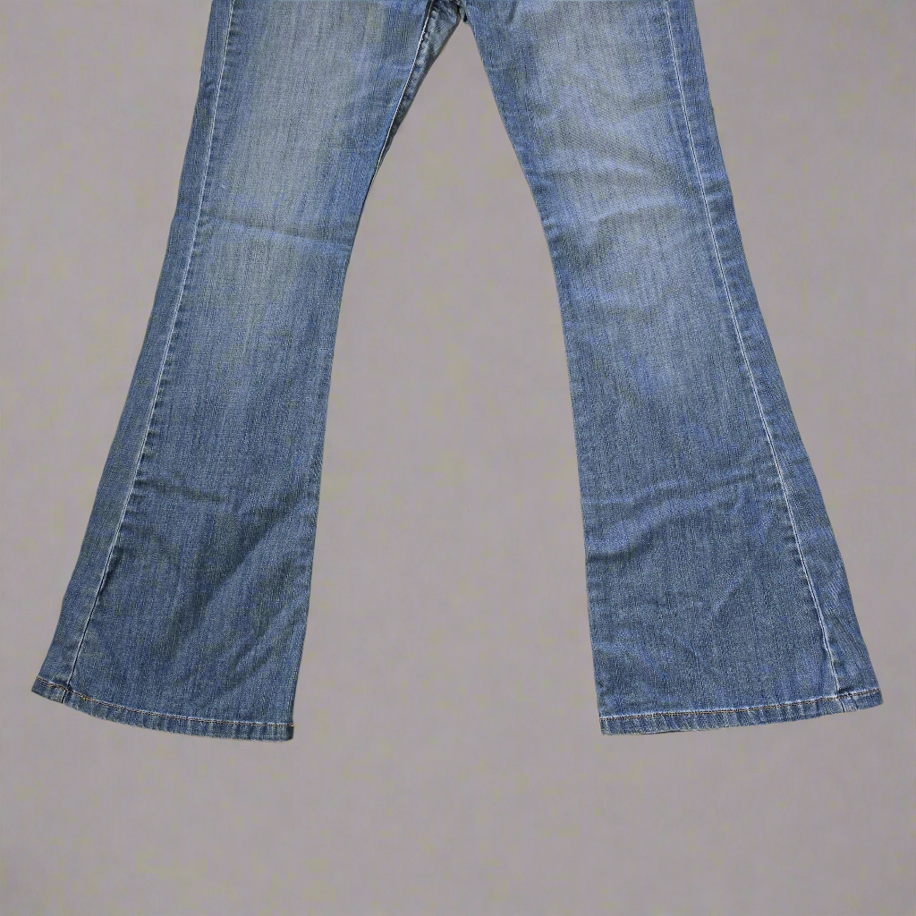 Pair of blue jeans on a plain background