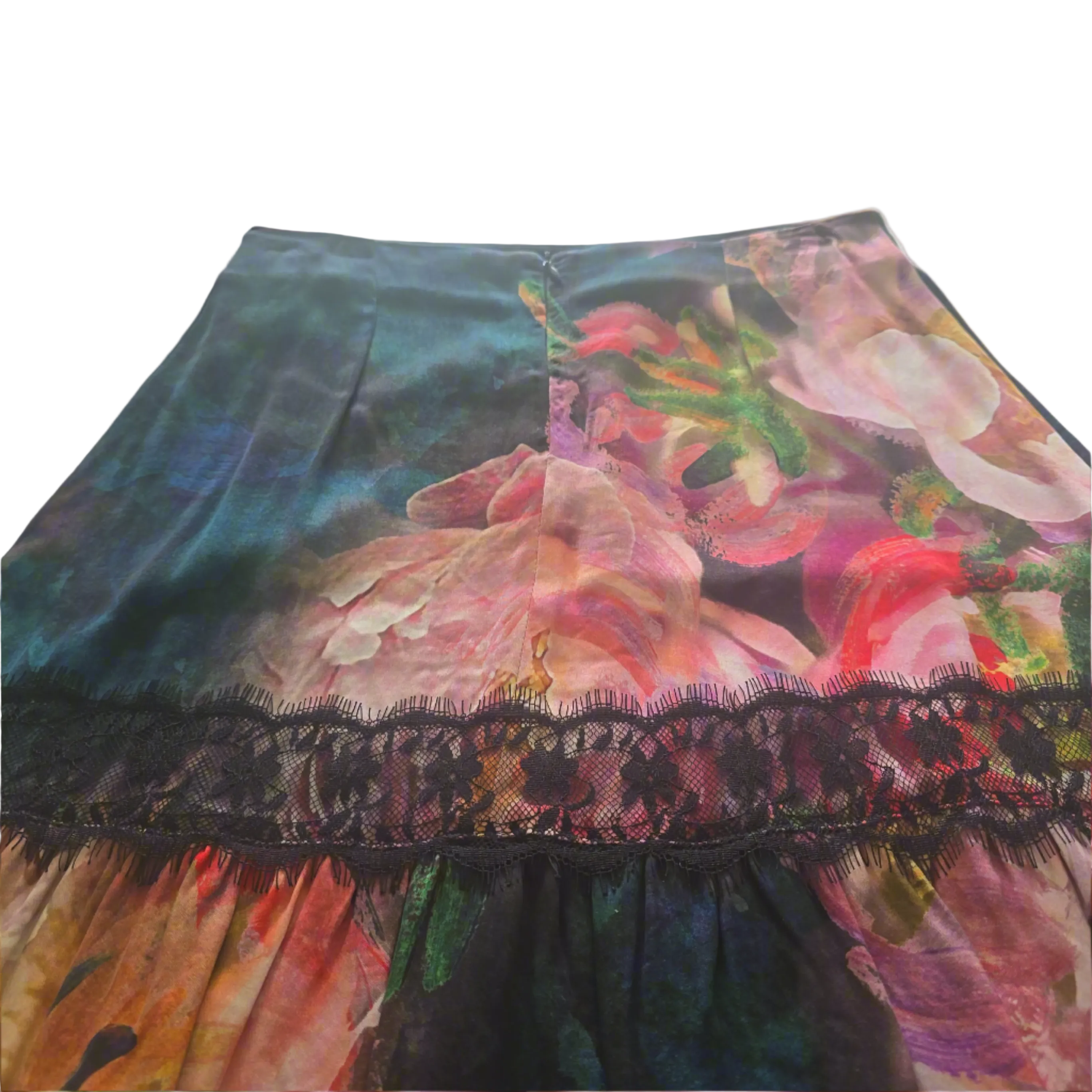 Floral patterned fabric with lace trim on a plain background