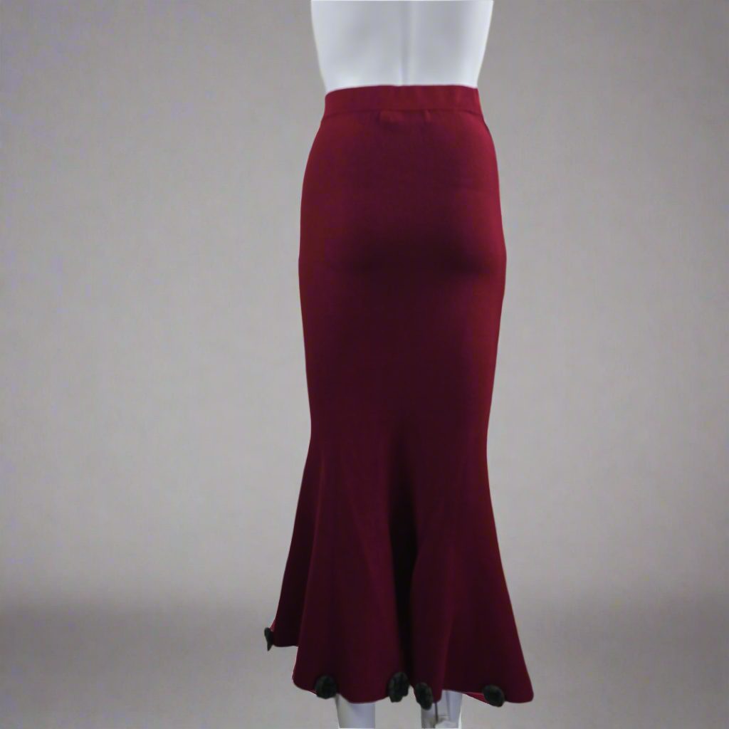 Maroon skirt on a mannequin against a plain background