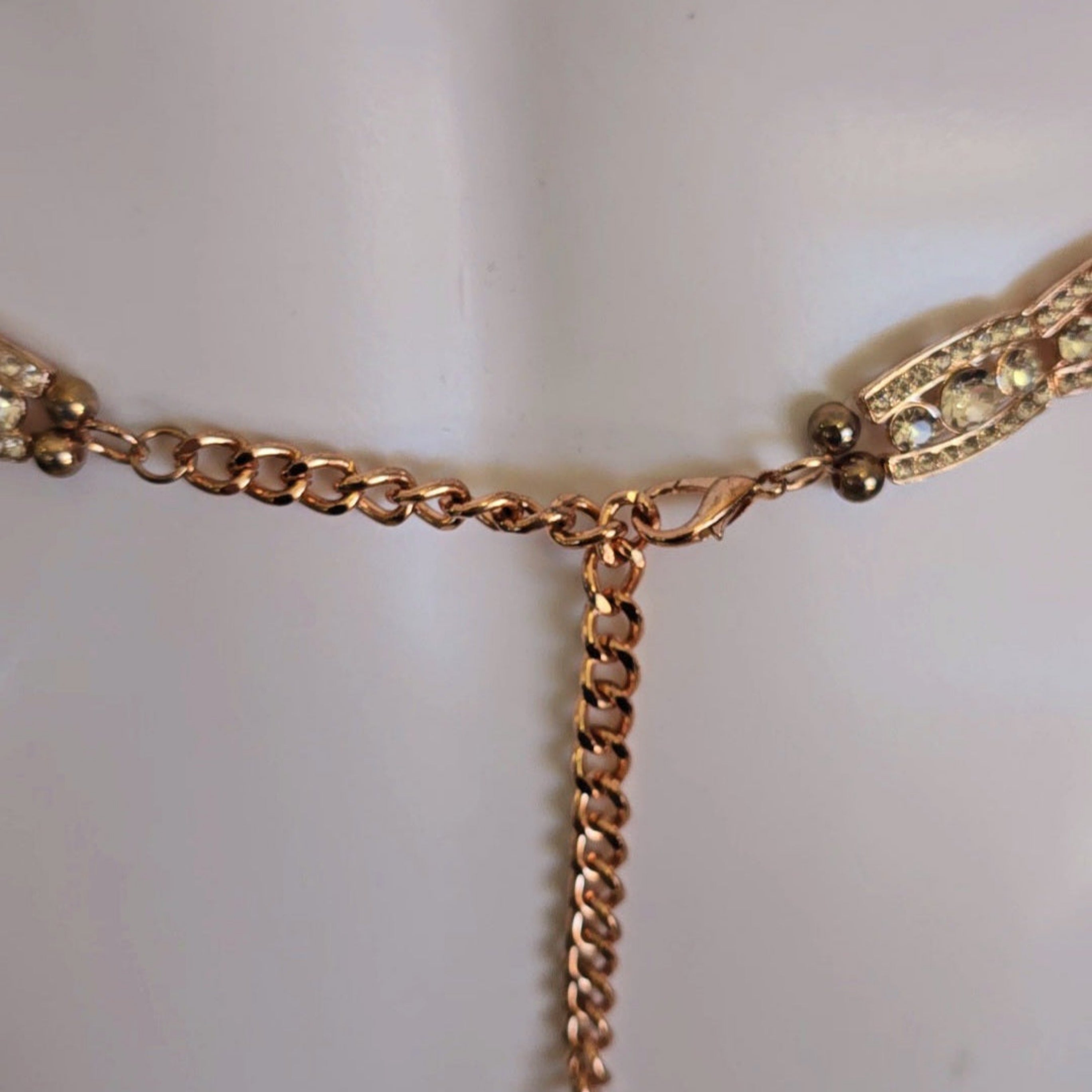 Gold chain belt on a white background