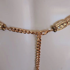 Gold chain belt on a white background
