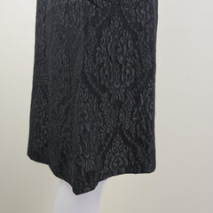 Black textured skirt on a white background
