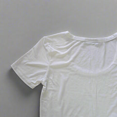White tank top on a tiled floor