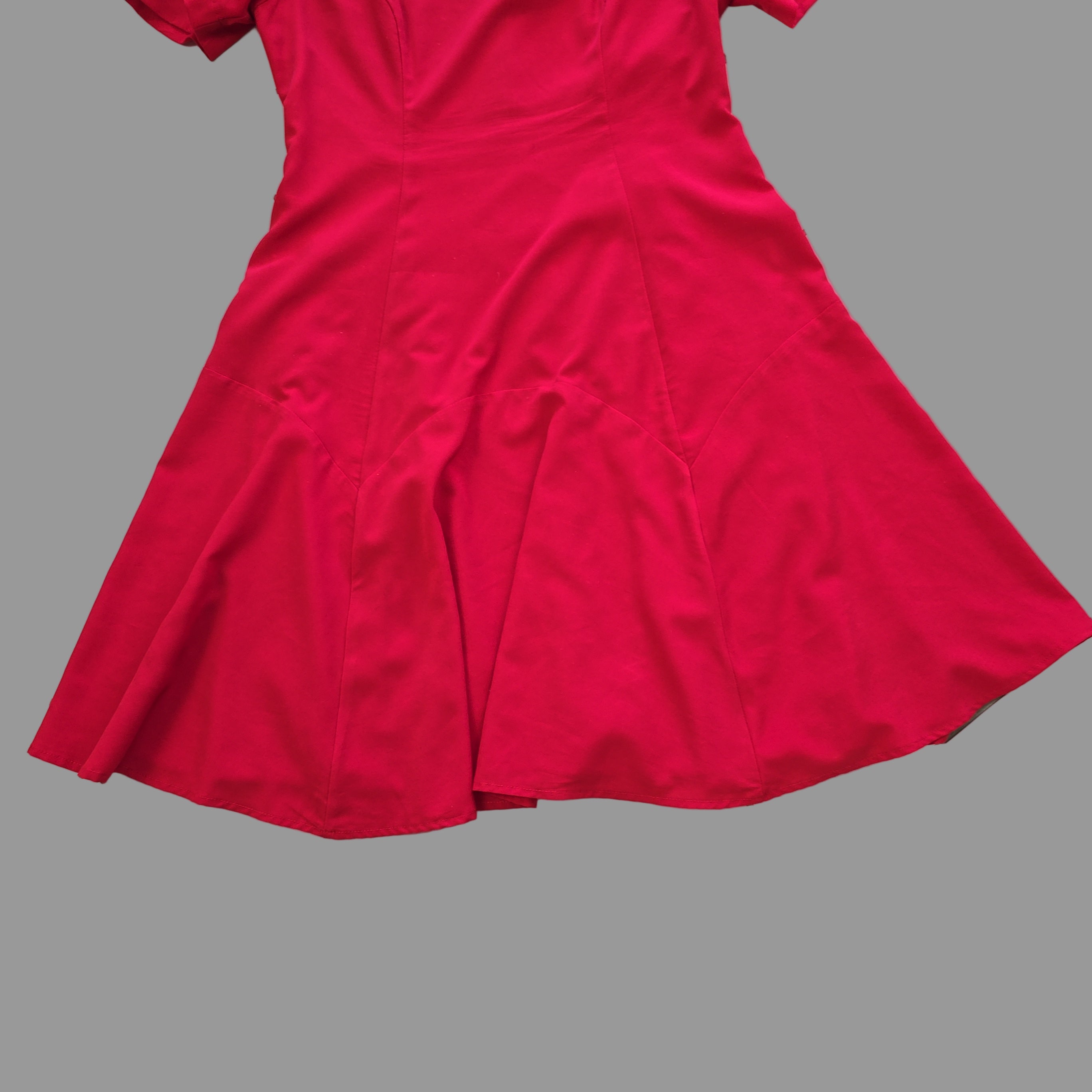 Red dress on a tiled floor