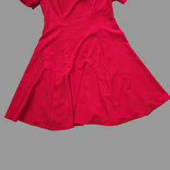 Red dress on a tiled floor