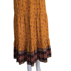 Brown patterned maxi skirt on a light background