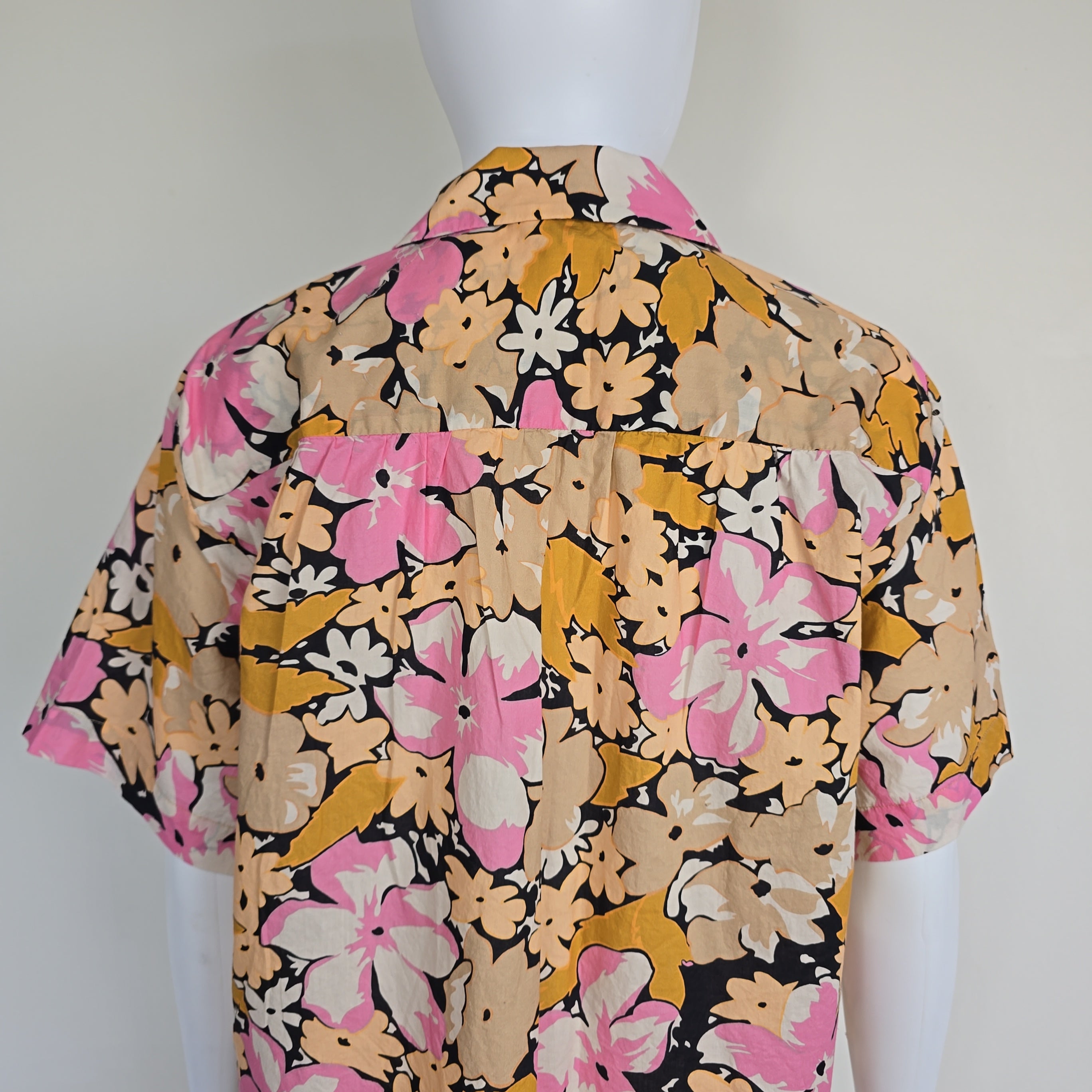 Floral-patterned fabric on a white mannequin