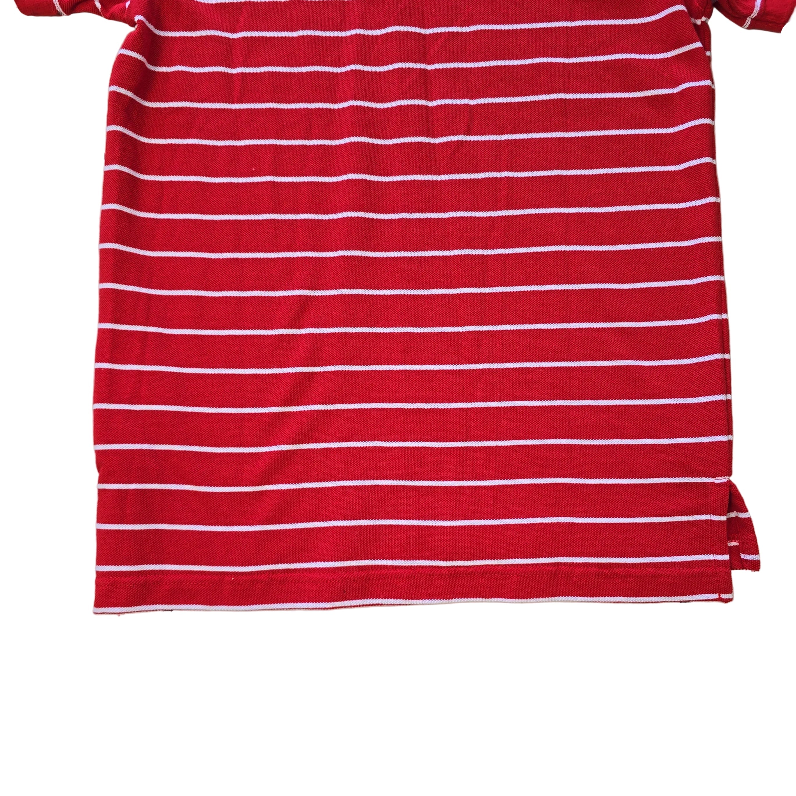 Red and white striped polo shirt on a light background