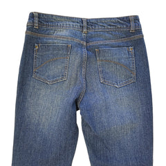 Pair of blue jeans on a light background
