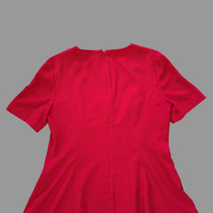 Red dress on a tiled floor