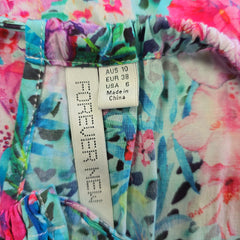 Colorful floral fabric with a 'Forever New' label