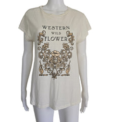 White tank top with decorative text and floral design on a mannequin against a beige background