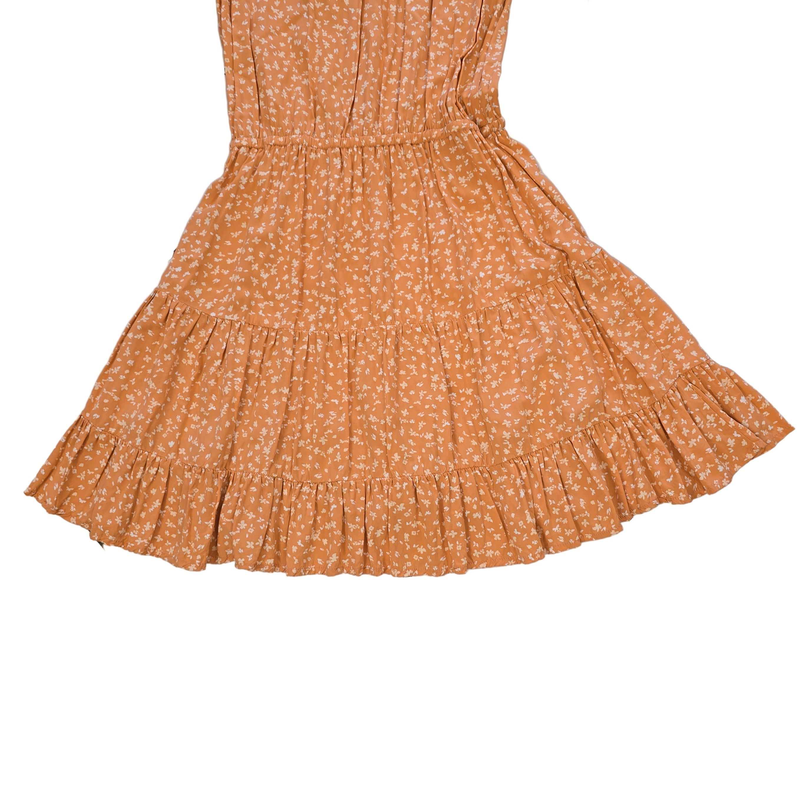 Orange floral dress on a light background