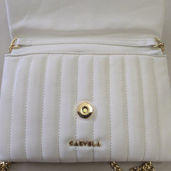 Close-up of a white quilted handbag with gold accents and 'Carvela' branding.