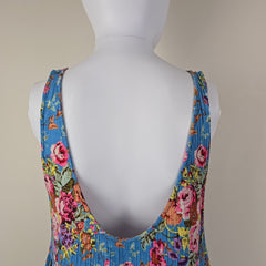Blue floral top with on a light background