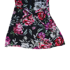 Floral-patterned mini dress on a light background