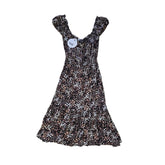 Leopard print dress on a light background