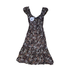 Leopard print dress on a light background