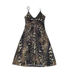 Leopard print dress on a light background