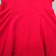 Close-up of a red garment with a focus on texture and color.