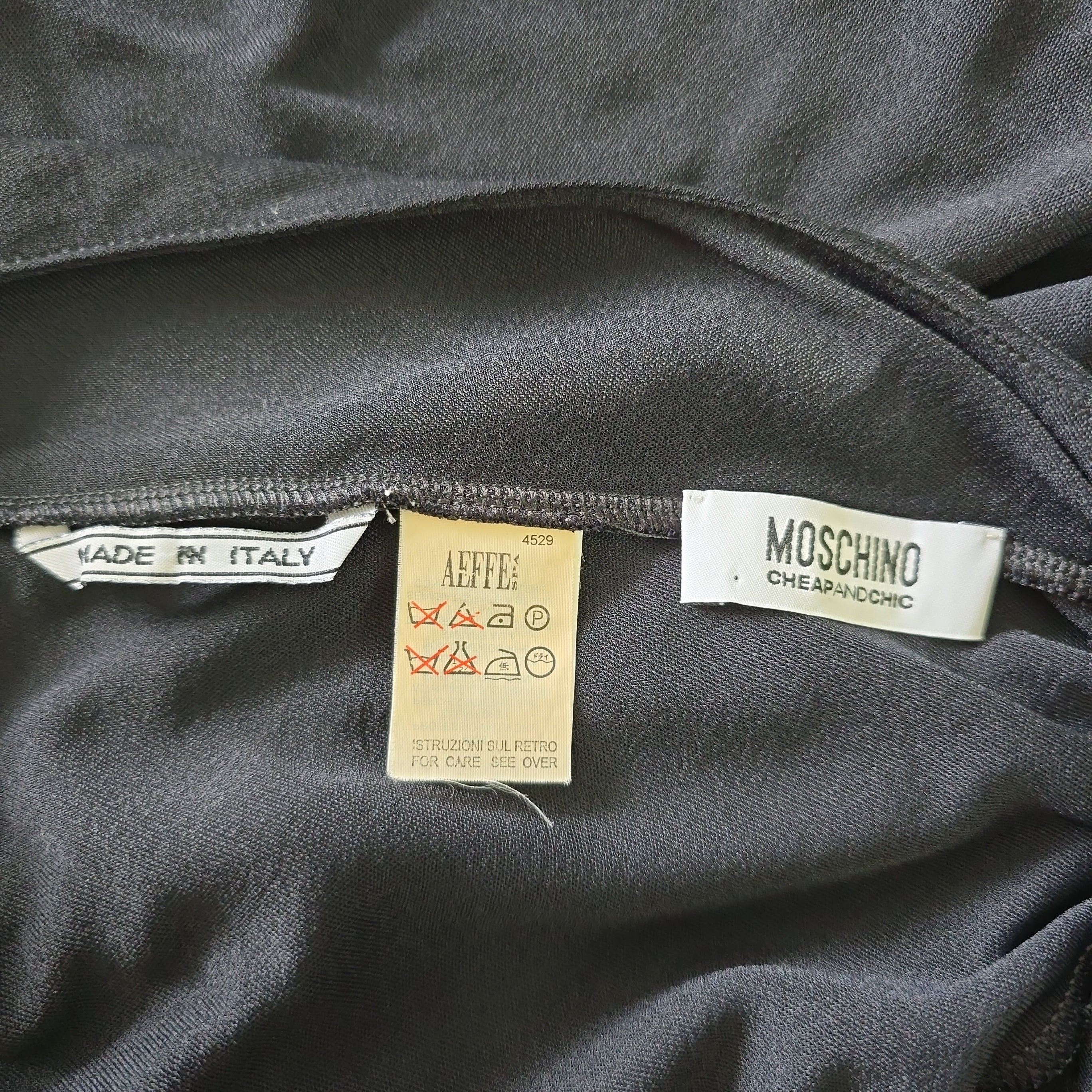 Close-up of brand labels on a dark background