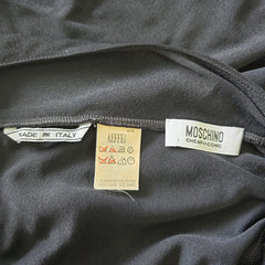 Close-up of brand labels on a dark background