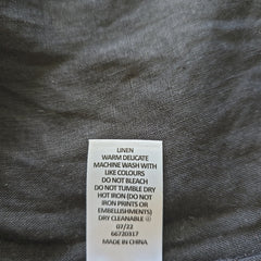 Fabric label on a gray fabric background