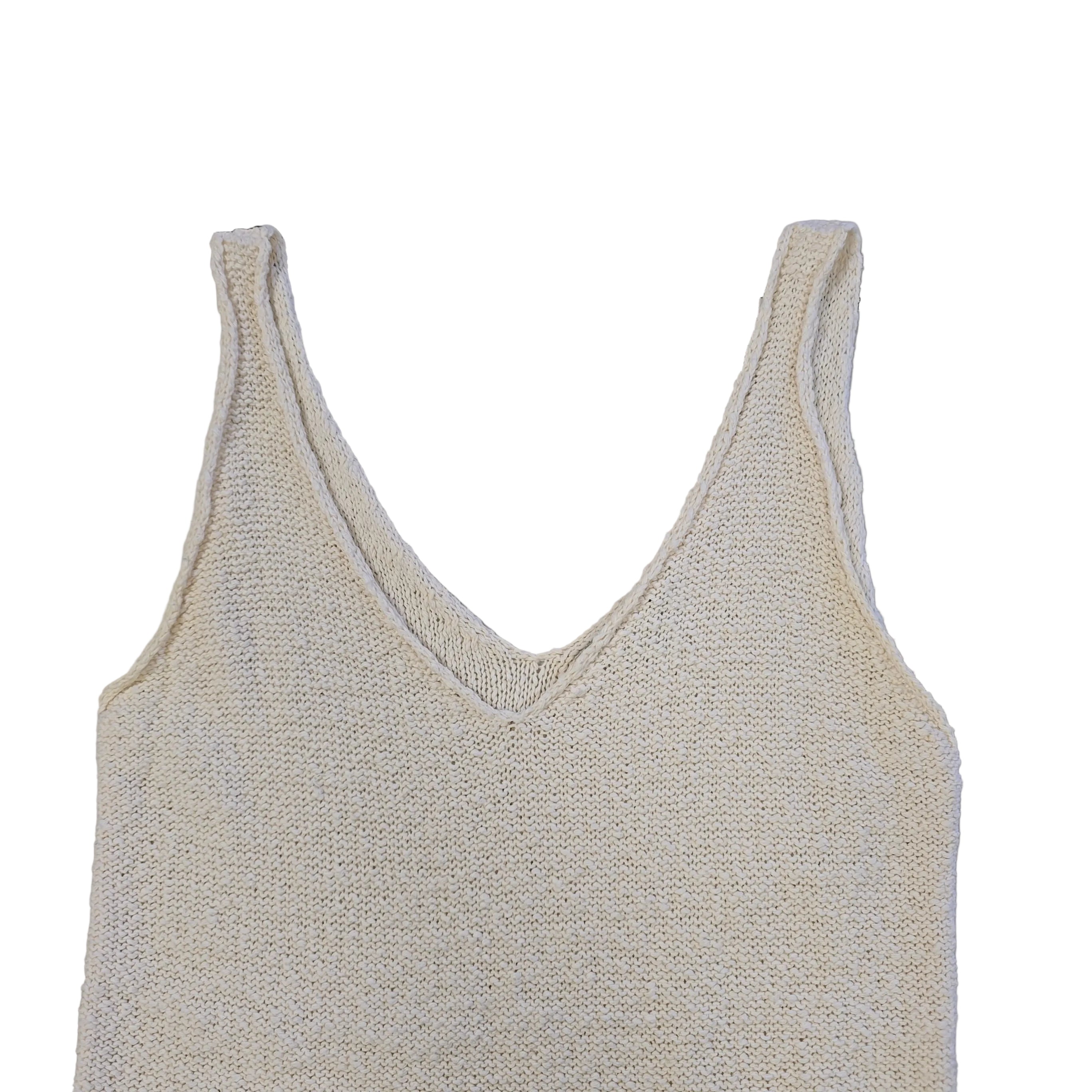 White knitted tank top on a light background