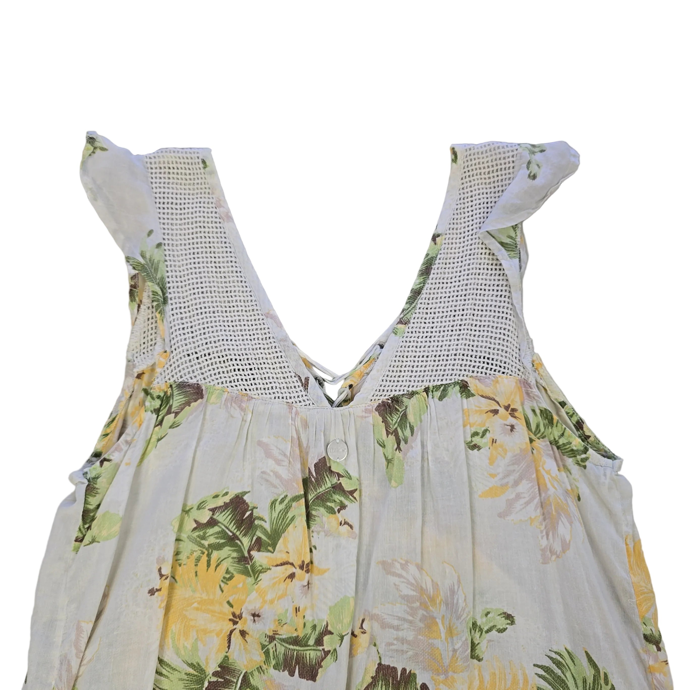 Floral dress with mesh details on a light background