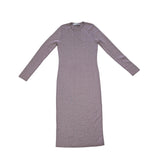 Plumb coloured dress with silver details on a light background