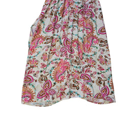 Floral patterned wrap style dress on a light background