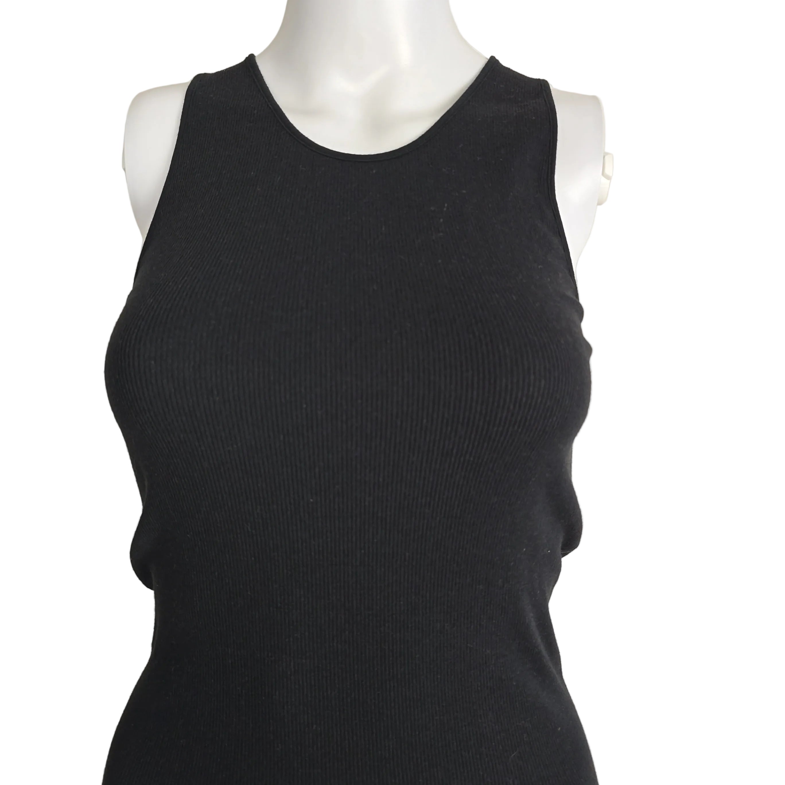 Black sleeveless top on a mannequin against a beige background