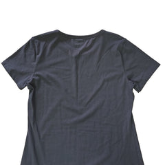 Black t-shirt dress with DKNY logo on a light background