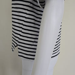 Close-up of a black and white striped shirt on a light background