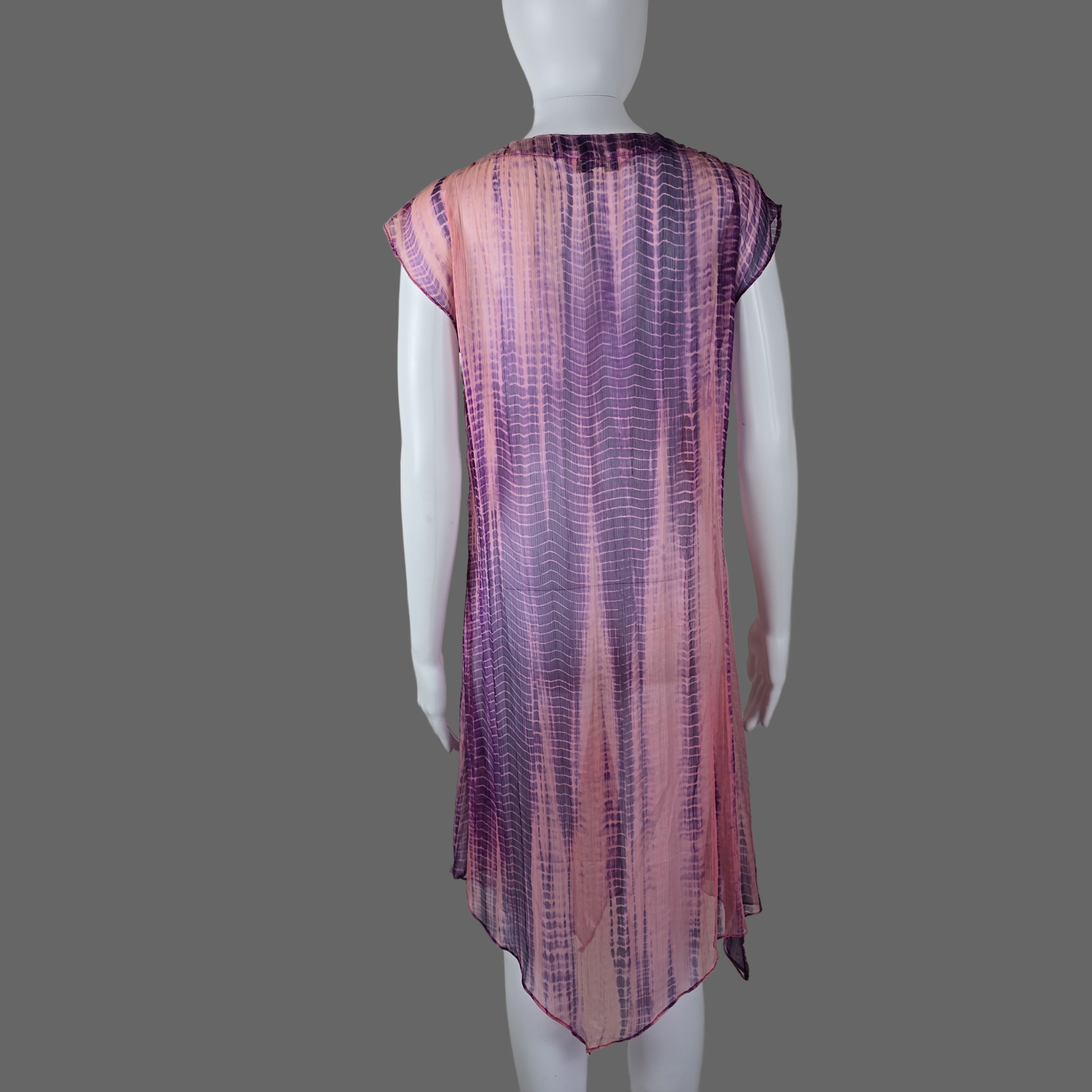 Purple and pink striped fabric on a white surface