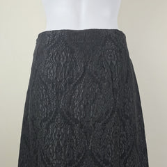 Textured black skirt on a white background