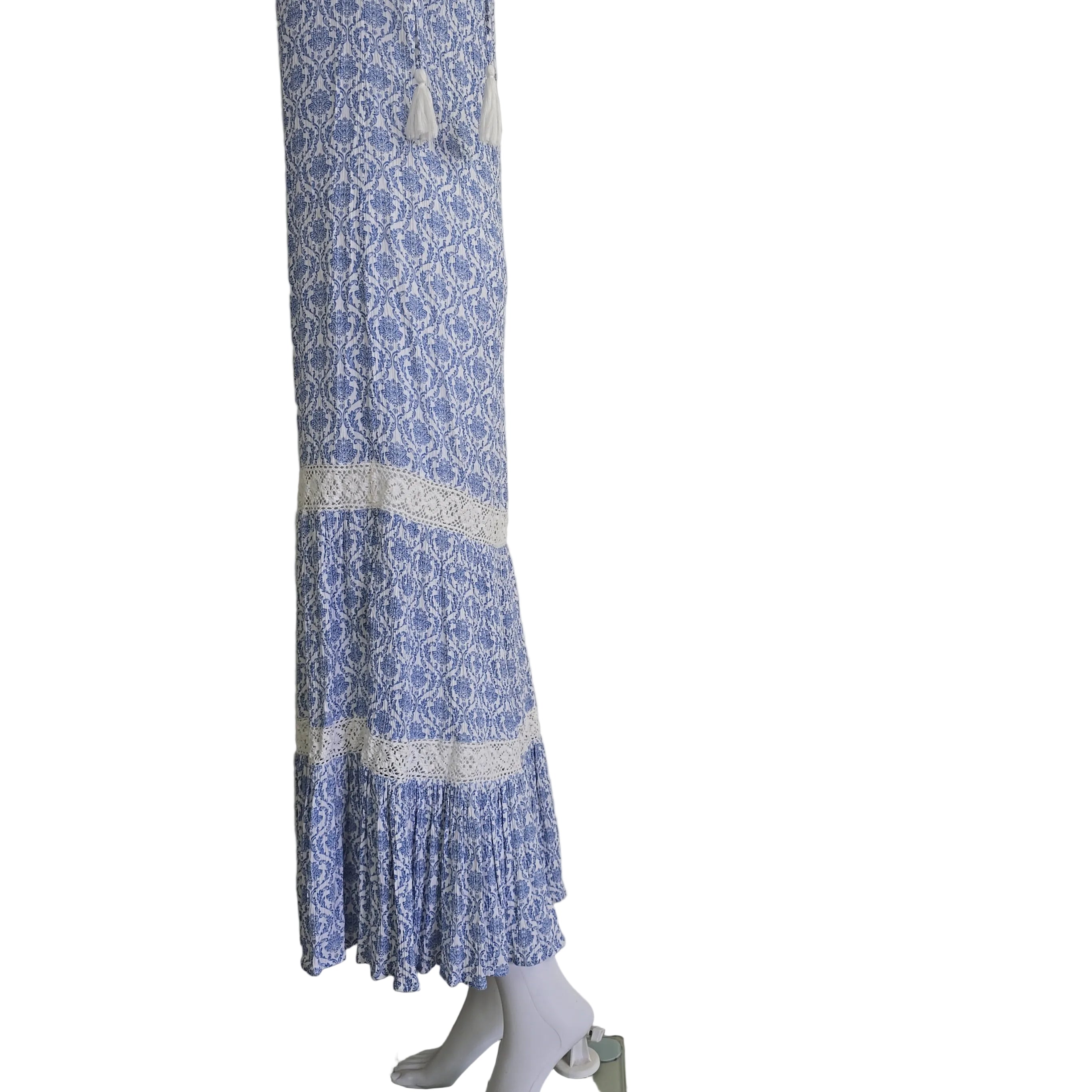 Blue and white patterned dress on a light background