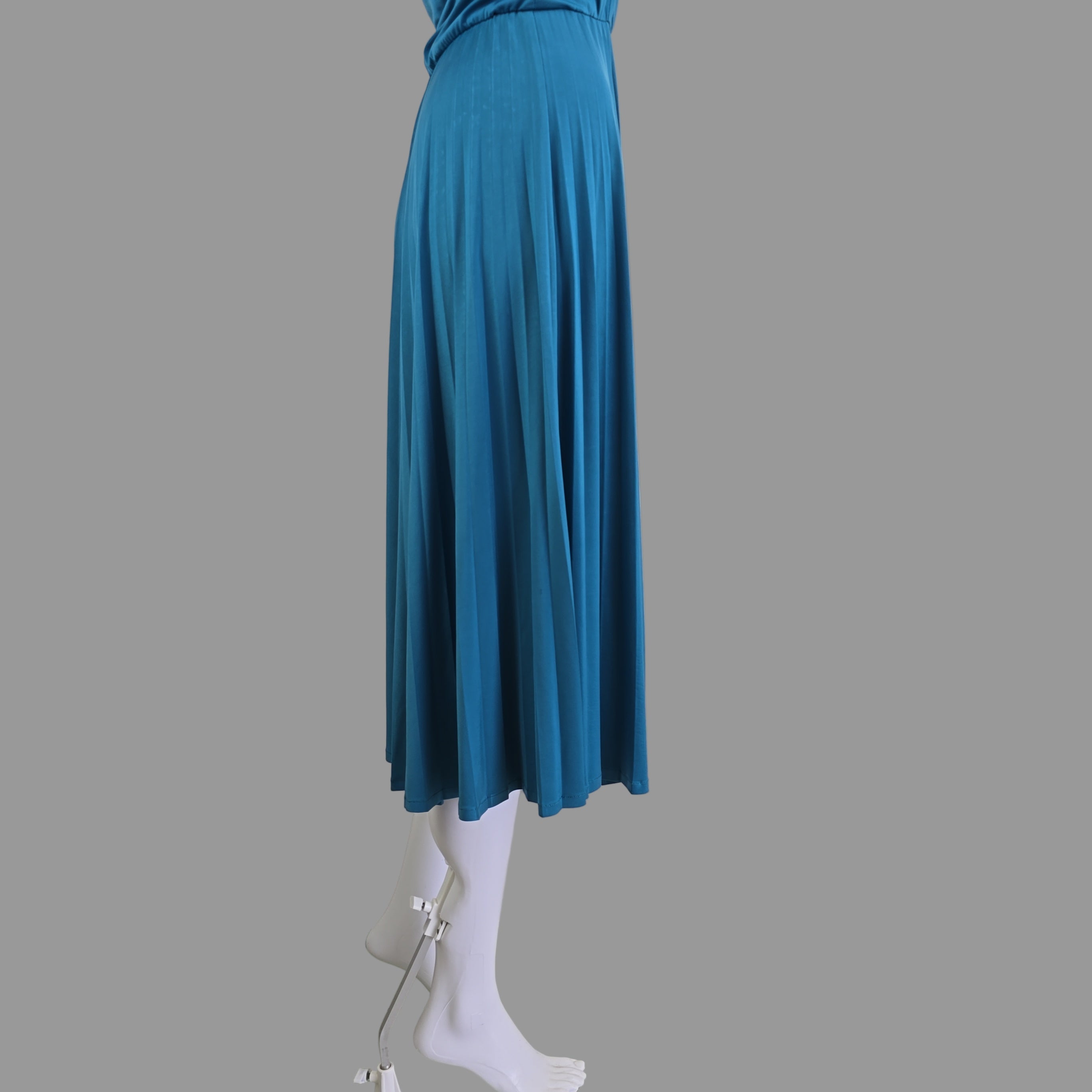 Blue pleated dress on a mannequin