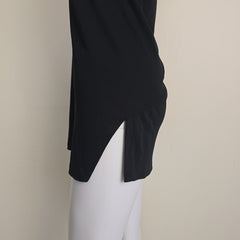 Black mini dress on a light background