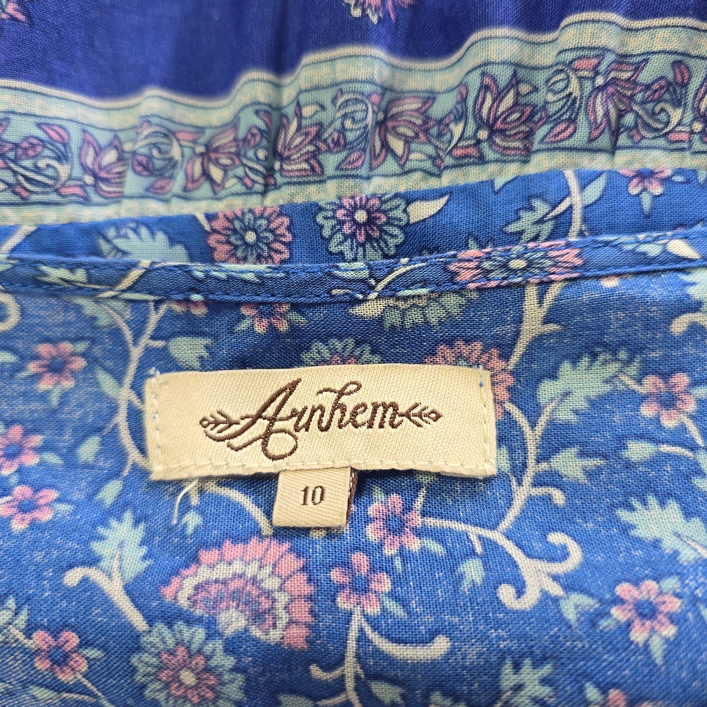 Floral patterned fabric with a label on a blue background