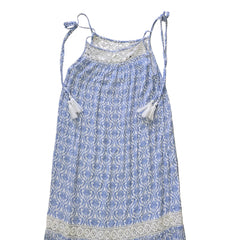 Blue and white patterned dress on a light background