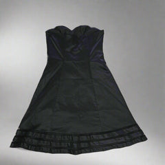 Black dress on a tiled floor