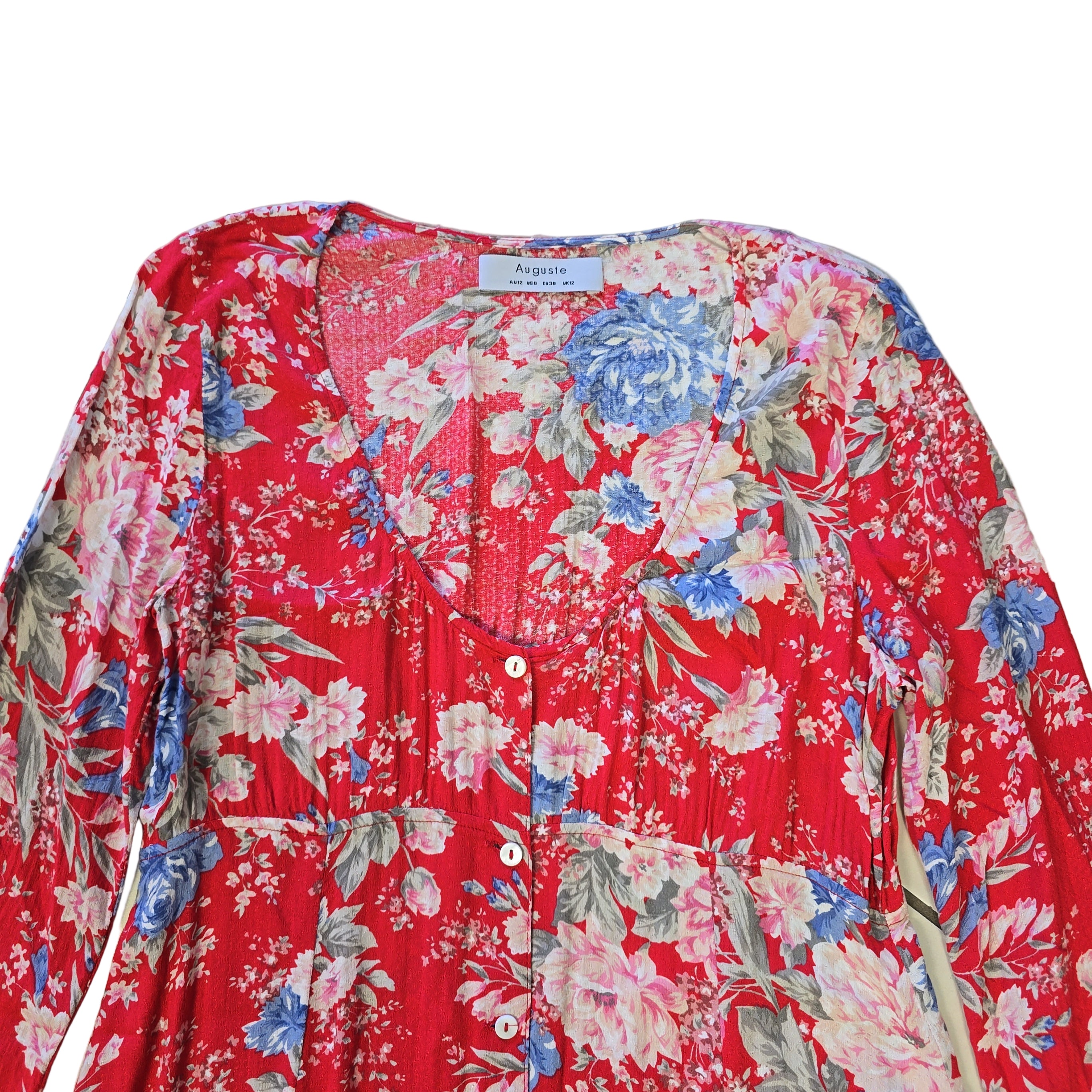 Red floral dress on a light background